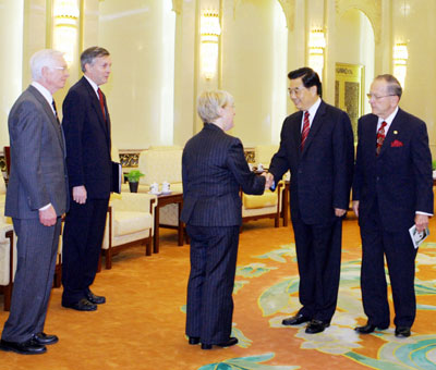 Chinese President Hu Jintao (3rd R) shakes hands with Washington State Senator Patty Murray as Pennsylvania Senator Arlen Specter (L) and Alaska Senator Ted Stevens (2nd R) watch during their meeting at the Great Hall of the People in Beijing August 12, 2006.