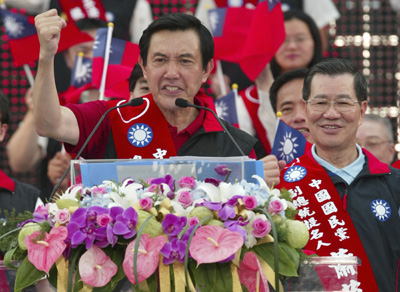 Taiwan's opposition leader Ma Ying-jeou gestures after he and his running mate for the 2008 election, Vincent Siew (R), were formally nominated by the Kuomintang (KMT) during the party congress in Taoyuan June 24, 2007. 