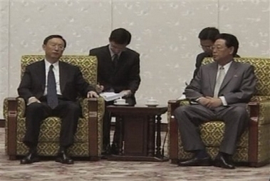 Chinese Foreign Minister Yang Jiechi, left, meets Vice North Korean Foreign Minister Kim Yong Il in Pyongyang, Tuesday, July 3, 2007, in this image made from TV.