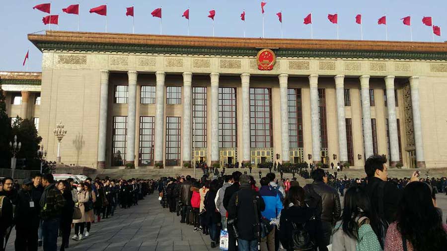 Reporters busy at the opening session of the NPC