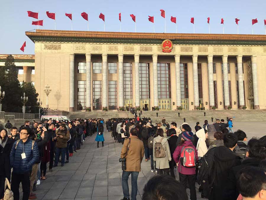 Reporters busy at the opening session of the NPC