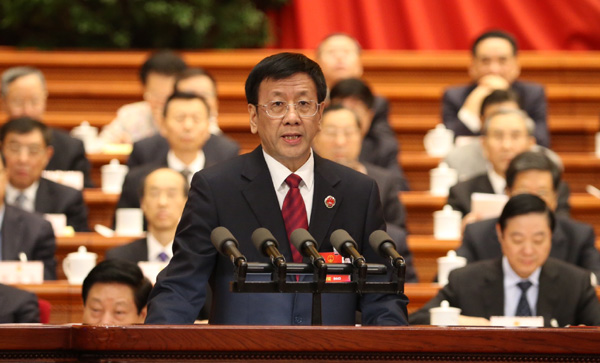 China's top procurator delivers work report