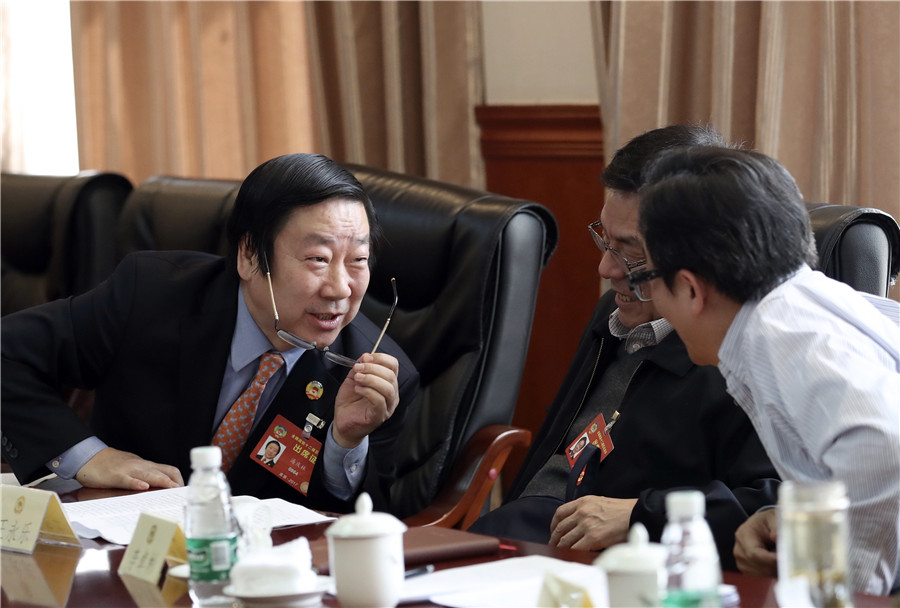 Political advisors deliberate CPPCC work report