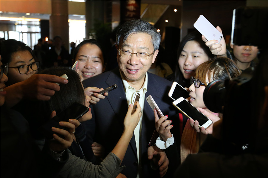 Political advisor takes questions after group meeting