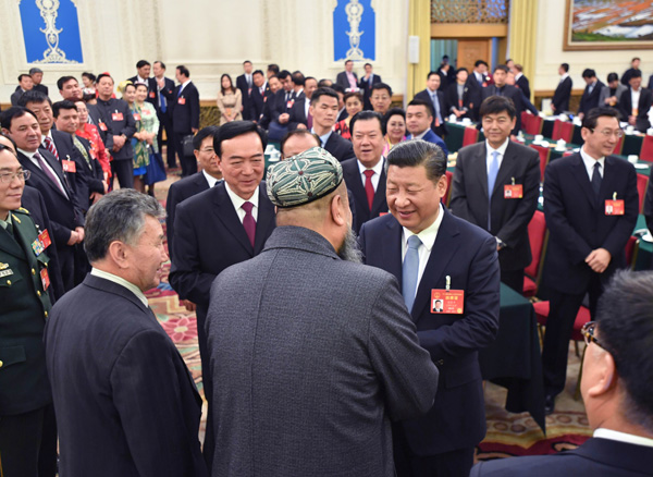 Xi calls for building 'great wall of iron' for Xinjiang's stability