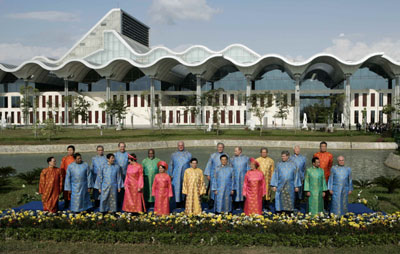 Leaders attending the Asia-Pacific Economic Cooperation (APEC) summit pose for a photo wearing traditional Vietnamese clothes, known as the 