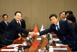 Premier Wen, S Korean president vow to boost ties