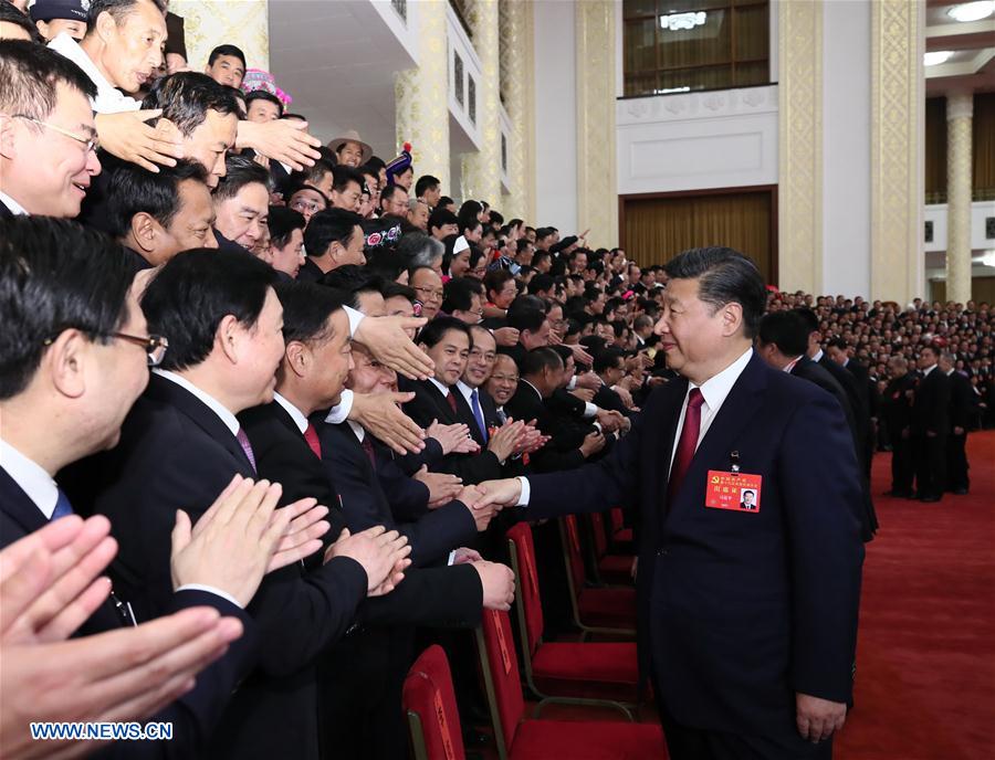 Xi meets congress delegates