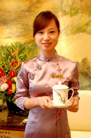 Cheongsam beauties welcome upcoming Summer Davos