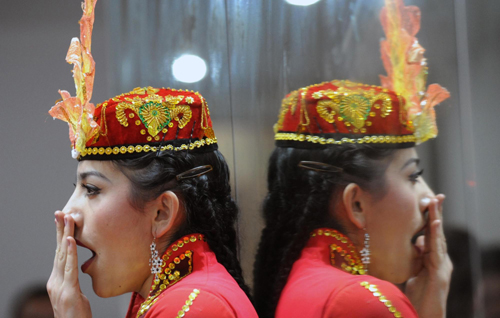 Folk dances stage at Xinjiang Pavilion