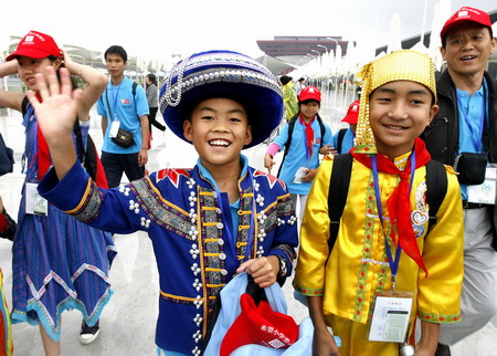 Children walk out of mountain for Expo