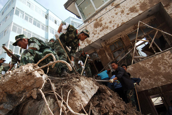 Aid, supplies pour into mudslide-flattened Zhouqu