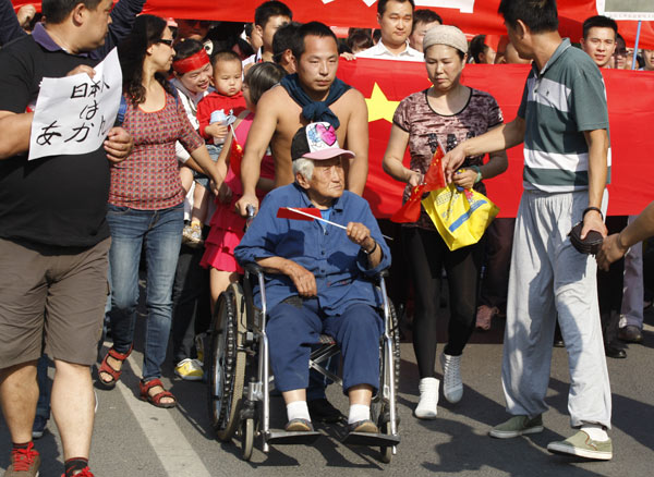 Citizens angry at Tokyo take to the streets