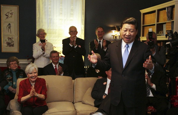 Xi charms hosts in Iowa