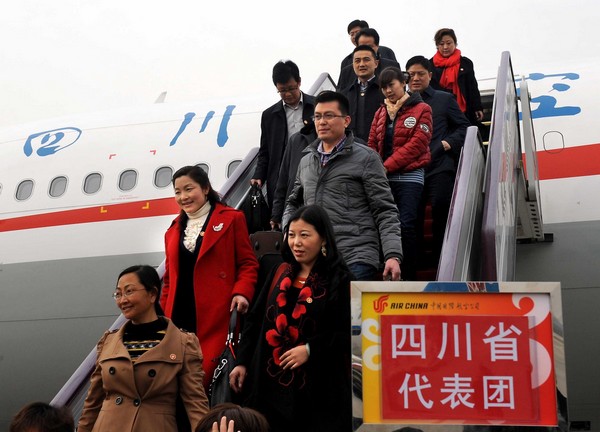 Deputies to 12th NPC arrive in Beijing