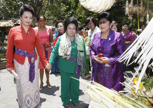 In Bali, they relax in local fashions