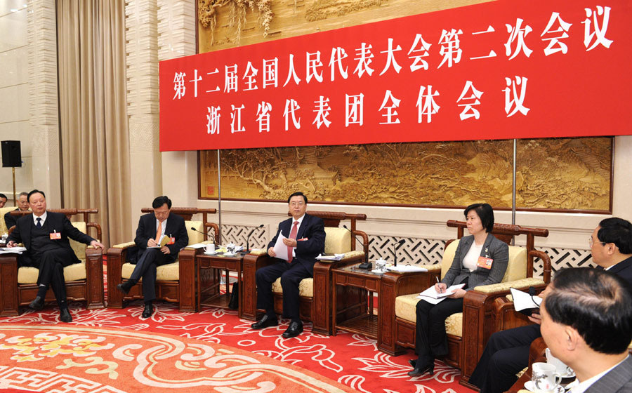 Chinese leaders join panel discussions