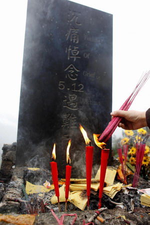 Quake county reopens to mourners