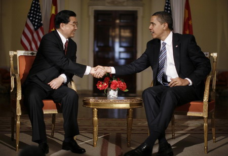 President Hu talks with Obama on ties, crisis