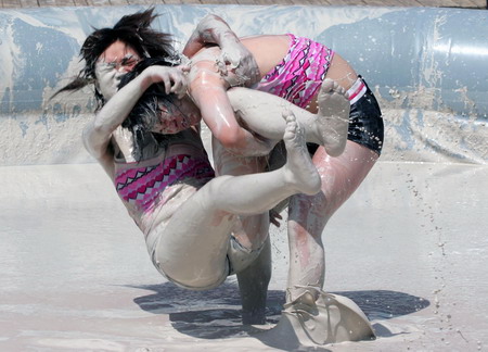 Mud and guts in women's mud wrestling contest