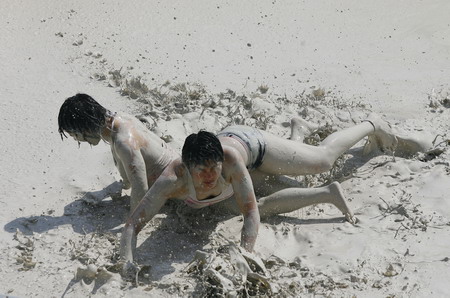 Mud and guts in women's mud wrestling contest