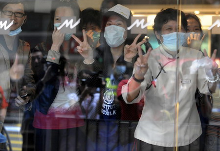 China vows to fend killer flu out of border