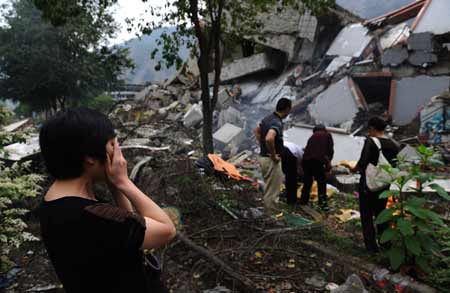 China opens quake-leveled county to mourners