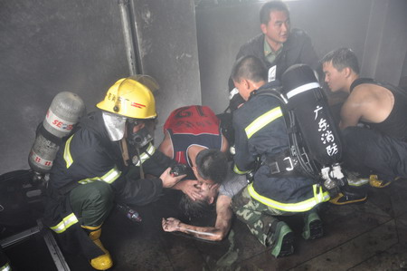 Fire kills 13 in earphone plant in south China