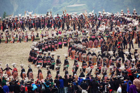 Miao people perform traditional group dance 