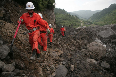 Rocks crash again, landslide rescue continues