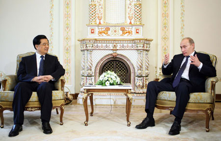 President Hu meets Putin in Moscow