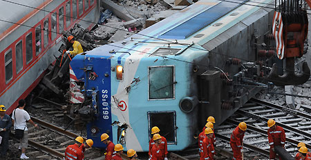 3 dead, 60 injured in central China train collision