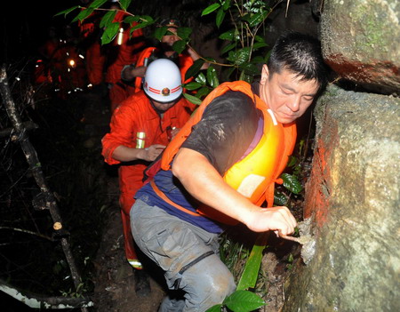 12 killed, 13 missing in SW China flood