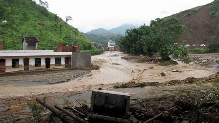 Flash floods kill 22 in SW China, 7 missing