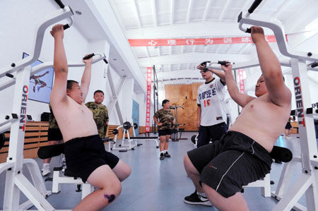 Boys shed fat at military school