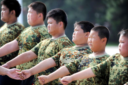 Boys shed fat at military school