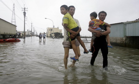 12 dead, 52 missing in Taiwan flooding: rescuers