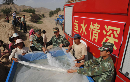 Firemen deliver life-saving water