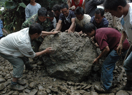 Death toll from SW China landslide rises to 9