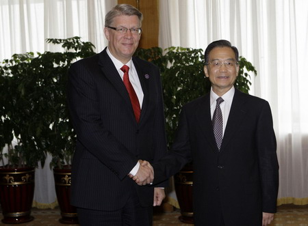 Premier Wen meets foreign officials during WEF in Dalian