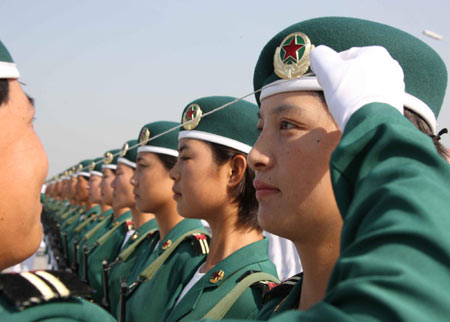 Woman soldiers exercise for National Day military parade