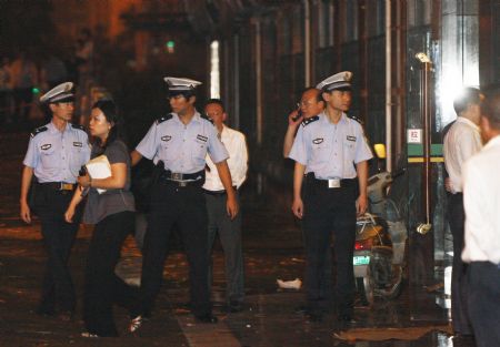 Shanghai police seize man holding girlfriend hostage