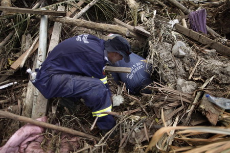 One Chinese dead, one missing in Samoa tsunami