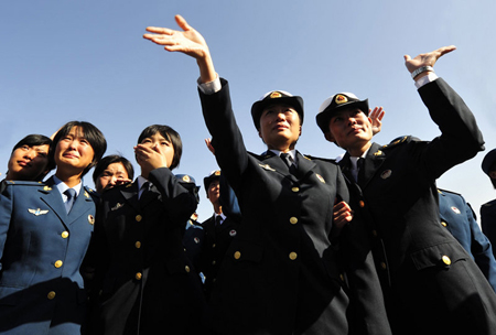 Parade soldiers start to retreat from drill camps