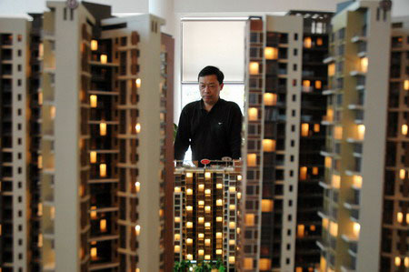 China tightens rules on property market