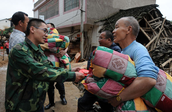 Emergency response launched as storms sweep south China