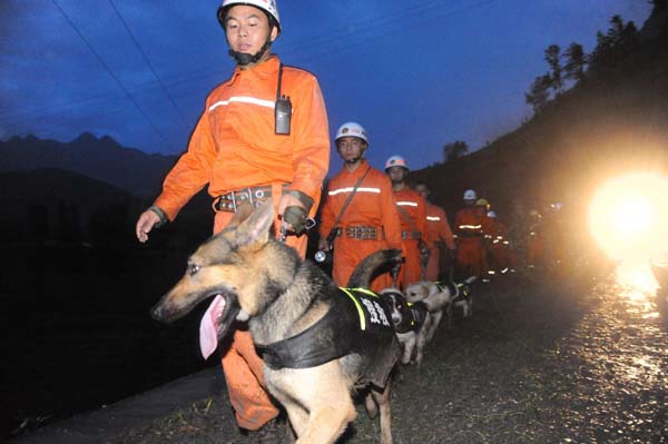 107 people trapped in SW China landslide