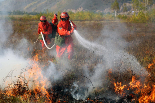 Colossal corps battling forest fires in N China