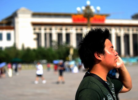 Beijingers wilt under hottest day