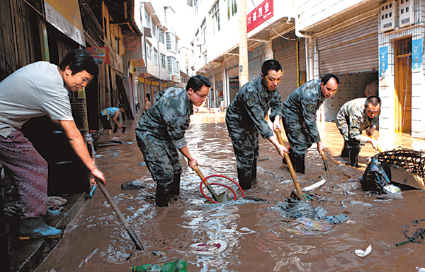 Worst floods in a decade leave 701 dead in China